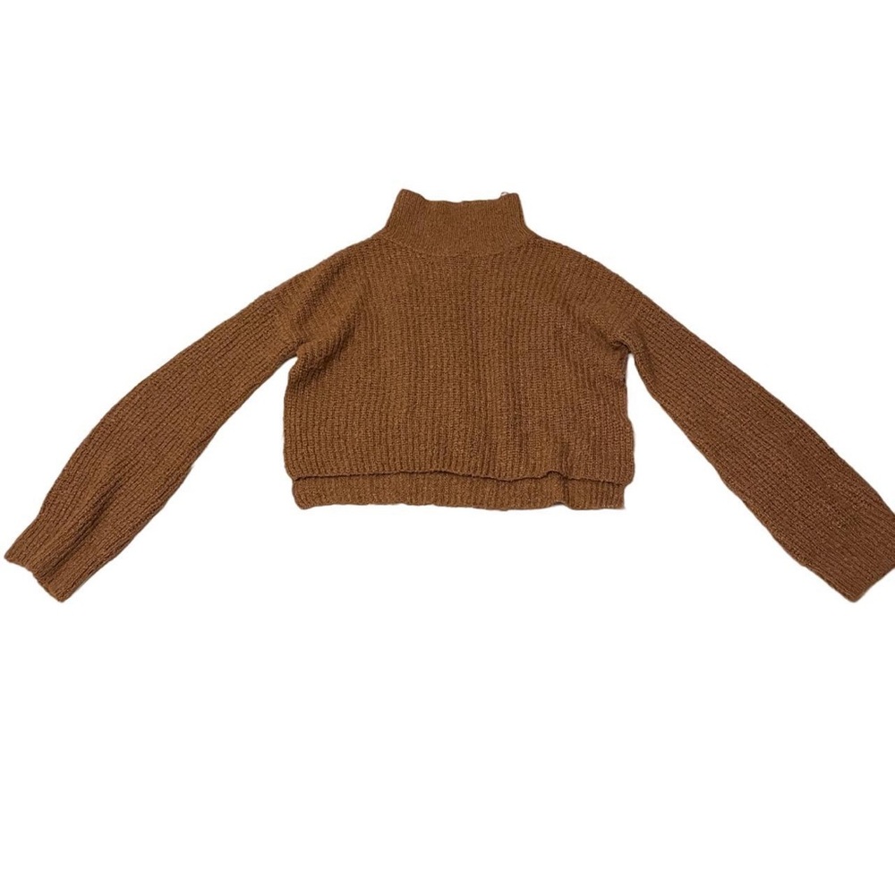 brown mock neck sweater with side slits at the bottom